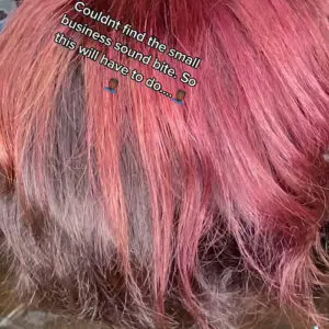 Vibrant wig with humorous text overlay