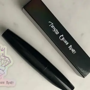 Mascara tube with packaging and logo sticker