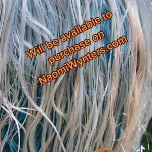 Blue and white wig with purchase text.