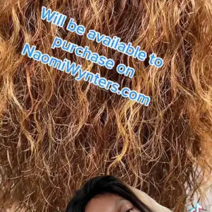 Person with blonde and black ombre hair