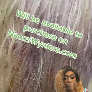 Blonde wig with text overlay